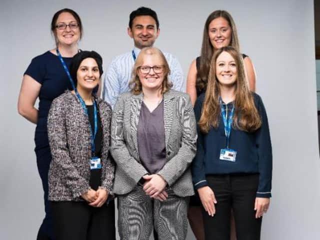 Head of A-levels Sarah Crossley (pictured front row, centre) with members of the teaching team from Burnley College Sixth Form Centre