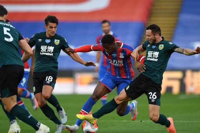 Phil Bardsley frustrates Wilf Zaha
