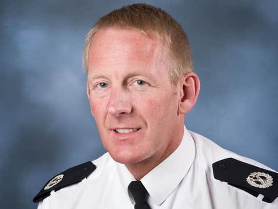 Chief Constable Andy Rhodes is stepping down