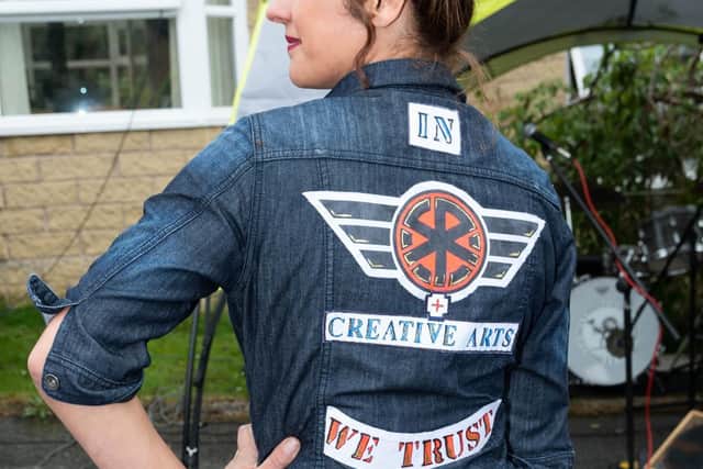 The logo says it all on the jacket sported by The Gallery at Creative Arts owner Natalie George