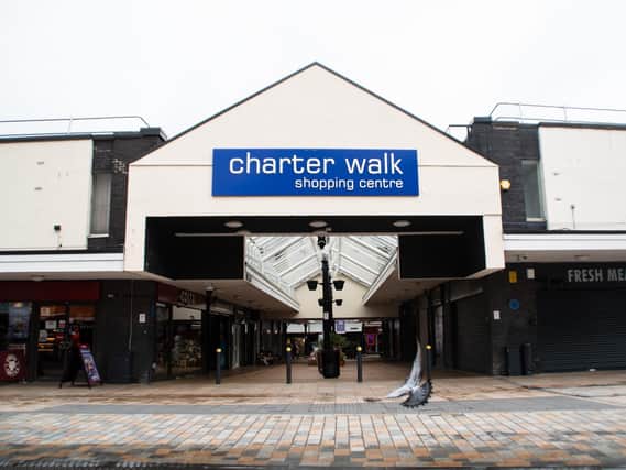 The yellow heart memorial can be seen in Charter Walk Shopping Centre, Burnley.