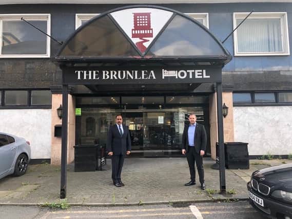 Burnley MP Antony Higginbothan (right) with Brun Lea Hotel owner Tony Hussain.