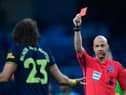 Which set of Premier League supporters would be shown the red card for foul and abusive language used in posts on social media?