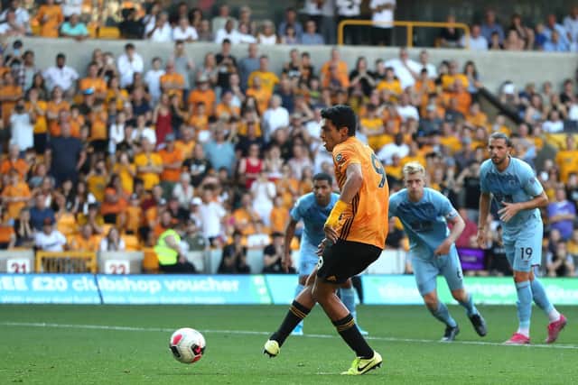 Raul Jimenez of Wolverhampton Wanderers scores last-minute penalty equalizer during the Premier League match between Wolverhampton Wanderers and Burnley FC at Molineux on August 25, 2019 in Wolverhampton, United Kingdom. (Photo by David Rogers/Getty Images)
