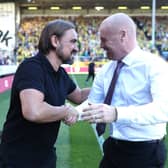 Daniel Farke, Manager of Norwich City shakes hands with Sean Dyche, Manager of Burnley prior to the Premier League match between Burnley FC and Norwich City at Turf Moor on September 21, 2019 in Burnley, United Kingdom. (Photo by Alex Morton/Getty Images)
