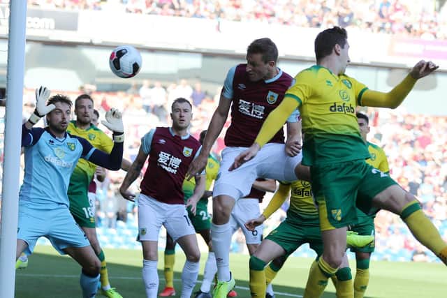 Chris Wood of Burnley scores his teams first goal during the Premier League match between Burnley FC and Norwich City at Turf Moor on September 21, 2019 in Burnley, United Kingdom. (Photo by Nigel Roddis/Getty Images)