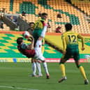 Chris Wood of Burnley scores his team's first goal during the Premier League match between Norwich City and Burnley FC at Carrow Road on July 18, 2020 in Norwich, England. (Photo by Lindsey Parnaby/Pool via Getty Images)