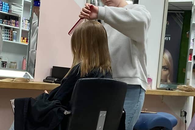 Isla getting her hair cut