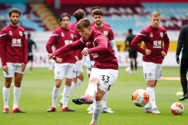 Max Thompson warms up ahead of the game against Wolves at Turf Moor