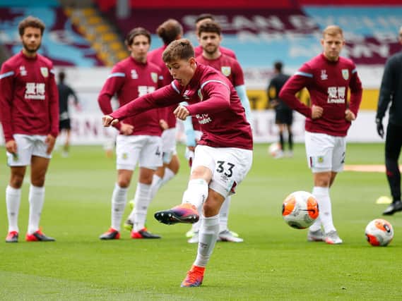 Max Thompson warms up ahead of the game against Wolves at Turf Moor