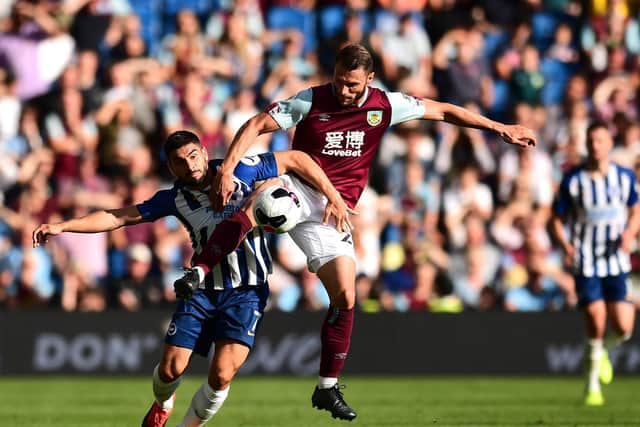 Neal Maupay of Brighton and Hove Albion battles for possession with Erik Pieters of Burnley during the Premier League match between Brighton & Hove Albion and Burnley FC at American Express Community Stadium on September 14, 2019 in Brighton, United Kingdom. (Photo by Alex Broadway/Getty Images)
