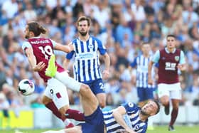 Shane Duffy of Brighton & Hove Albion battles ofr the ball with Jay Rodriguez of Burnley during the Premier League match between Brighton & Hove Albion and Burnley FC at American Express Community Stadium on September 14, 2019 in Brighton, United Kingdom. (Photo by Dan Istitene/Getty Images)