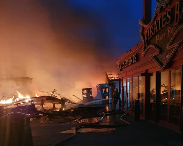 A fire broke out on Blackpool's Central Pier at 3.20am on Friday, July 17, 2020. The blaze, which threatened to engulf the 150-year-old attraction, started in a workshop before spreading to the waltzers and another nearby ride (Picture: South Shore Fire Station/Twitter/Lancashire Fire and Rescue Service)