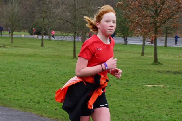 Darcey Hirst (12) is running a mile a day for a month to raise cash for Pendleside Hospice in memory of her grandfather.