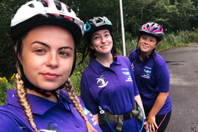 Camelot riders Olivia Hirst (front) Helen Ingham and Amelia Hirst pause for a selfie