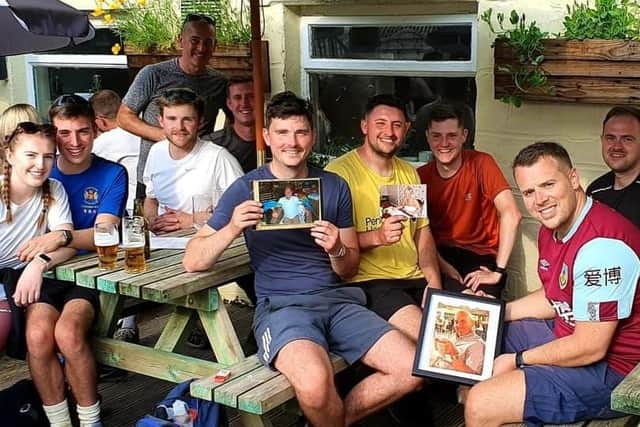 Pictured celebrating their successful completion of the Yorkshire Three Peaks are (left to right) Holly Beresford, Daniel Simm, Niall Ormerod, Pete Simm (standing)  Gareth Jones,  Luke Ornerod (holding a picture of his dad Bob) Josh Nutter( with a picture of his mum Jayne) David Boys,  Matt (with a picture of his dad Paul) and Nick Holroyd.

Peter Simm, Nick Holroyd, Gareth Jones, David Boys, Daniel Simm and Holly Beresford.