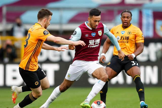 Dwight McNeil of Burnley controls the ball during the Premier League match between Burnley FC and Wolverhampton Wanderers at Turf Moor on July 15, 2020 in Burnley, England. (Photo by Clive Brunskill/Getty Images)