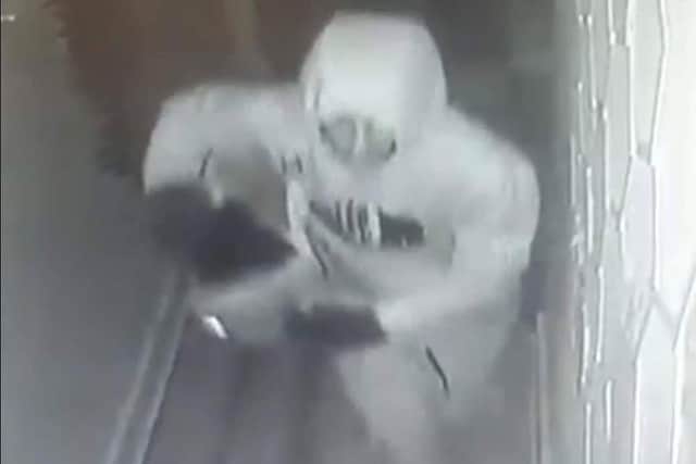 One of the CCTV images of the thief who broke into Bliss beauty salon in Burnley