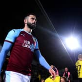 Steven Defour of Burnley leads his team out prior to the Carabao Cup Third Round match between Burton Albion and Burnley at Pirelli Stadium on September 25, 2018 in Burton-upon-Trent, England. (Photo by Nathan Stirk/Getty Images)