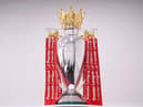The Premier League Trophy is dressed in Liverpool Red Ribbons ready for the presentation ceremony.