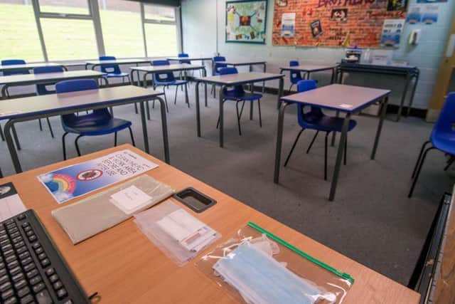 Under current lockdown rules, pupils and staff at secondary schools and colleges in Burnley will be required to wear face coverings when they return. Photo: Getty