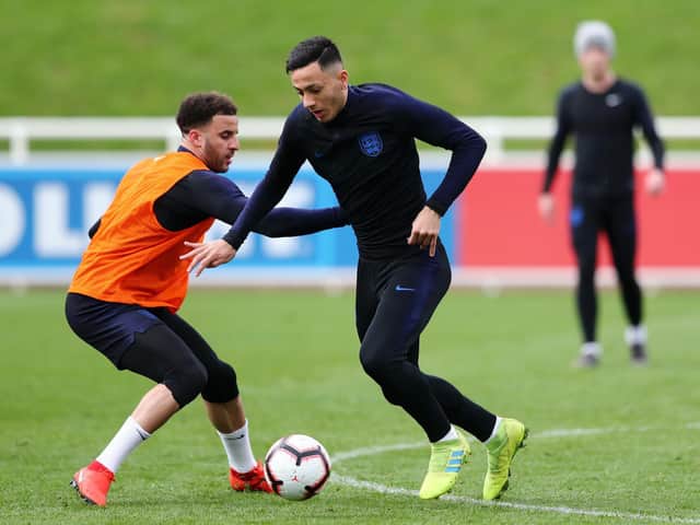 Dwight McNeil of England in action as Kyle Walker of England looks on during an England training session during an England Media Access day at St Georges Park on March 19, 2019 in Burton-upon-Trent, England. (Photo by Matthew Lewis/Getty Images)