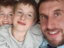Andy with his twin sons Luke and Liam who were the inspiration for his debut children's novel The Super Twins