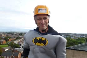 Stephen Greenhalgh,who is retiring this week as Chief Executive of St Catherine's Hospice, pictured doing a sponsored abseil in aid of the charity.