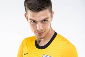 Nick Pope shows off the new England goalkeeping jersey
