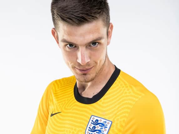 Nick Pope shows off the new England goalkeeping jersey