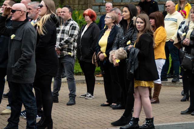 Some of the mourners who gathered to say a final farewell to Nikki Sawley