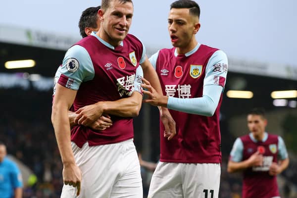 Chris Wood of Burnley celebrates with teammates after scoring his team's second goal during the Premier League match between Burnley FC and West Ham United at Turf Moor on November 09, 2019 in Burnley, United Kingdom. (Photo by Alex Livesey/Getty Images)