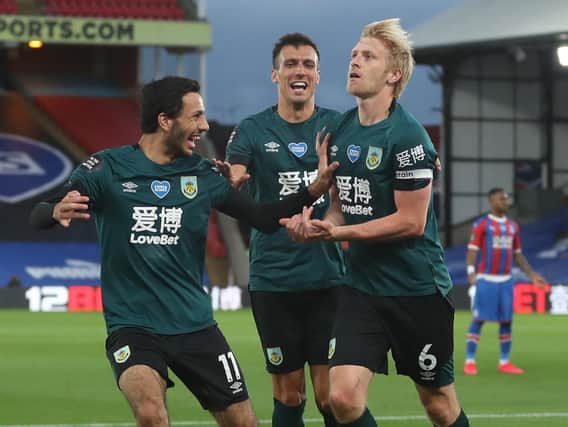 Ben Mee, right, and Jack Cork, centre