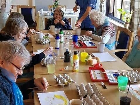 Local care home residents enjoying their art workshop