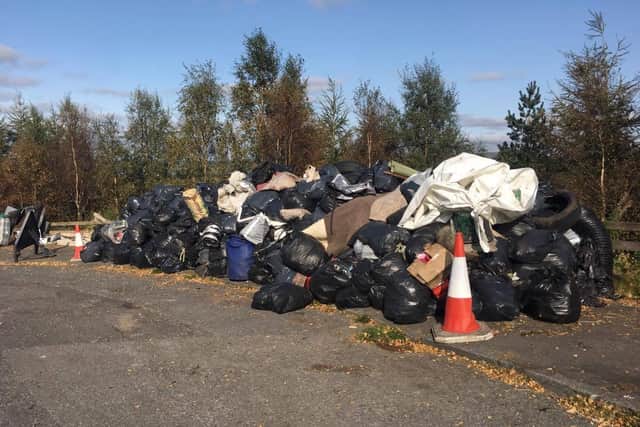Dozens of bags awaiting collection from the Bacup Road flytip site yesterday afternoon