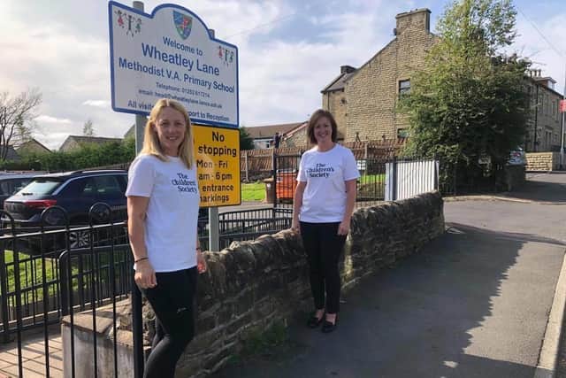 Colleagues Sarah Brown  (right) and Franchesca Smith are running 50 miles this month to raise money for The Children's Society