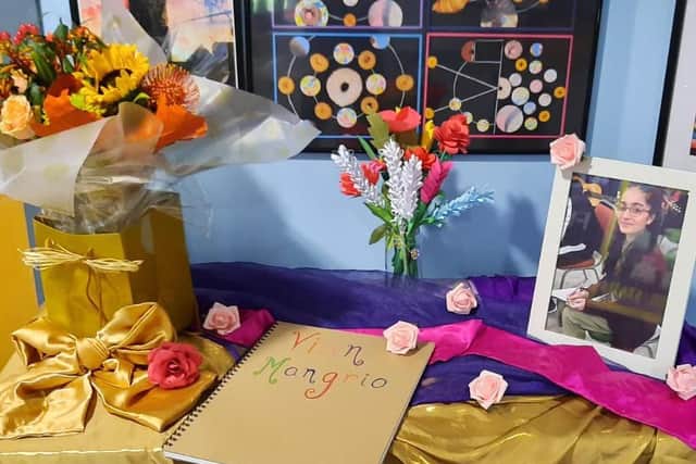 Floral tributes and a book of condolences has opened at the school