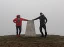 The trig point at Pendle Hill is going to be a very familiar sight to Scott Pickles (left) and Deehan during their plan to lap the hill as many times as possible in 24 hours