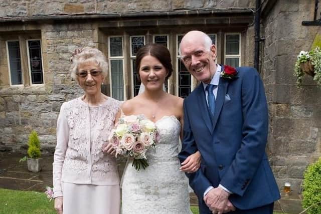 Ronald and Dorothy with their granddaughter Sarah on her wedding day