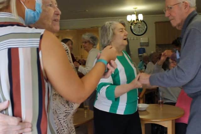 Staff and residents enjoying Tunes on Tuesday at Heather Grange