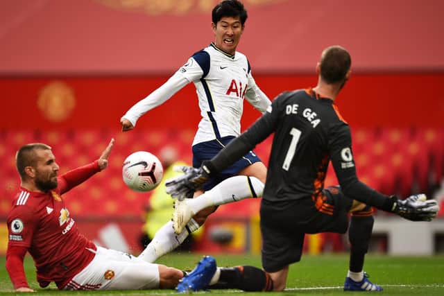 Heung-Min Son of Tottenham Hotspur scores his sides second goal during the Premier League match between Manchester United and Tottenham Hotspur at Old Trafford on October 04, 2020 in Manchester, England.