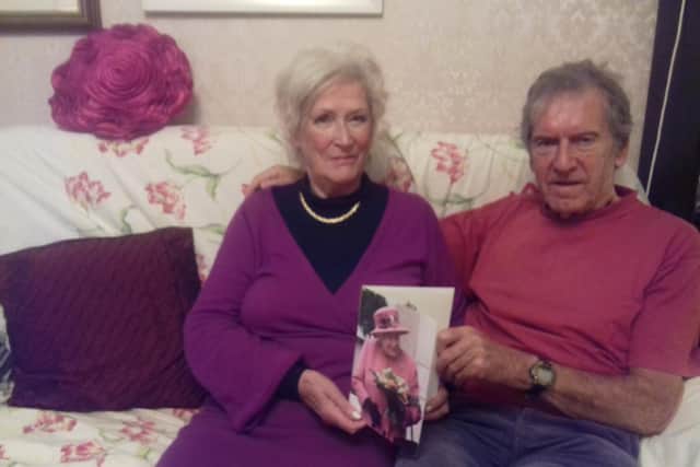 Brian and Dorothy Pomfret with their telegram from Her Majesty to celebrate their 60th wedding anniversary