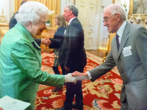 Ken Jackson meeting the Queen to celebrate 50 years of the Churchill Fellowships.