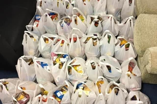 Bags of food parcels ready to go out by Charter House, Burnley