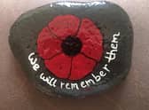 This beautiful painted poppy rock is one of 30 that has been hidden around the Ightenhill area of Burnley for residents to find by artist Tracey Smith