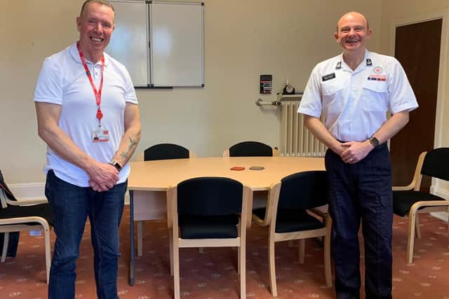 Alan (left) pictured with Chief Fire Officer Justin Johnston who said he has left a 'strong legacy' after serving as a firefighter for 35 years