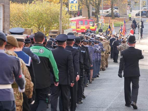 The Remembrance Sunday parade makes its way through Burnley town centre