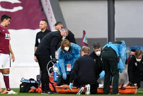 Johann Berg Gudmundsson is stretchered off against Sheffield United
