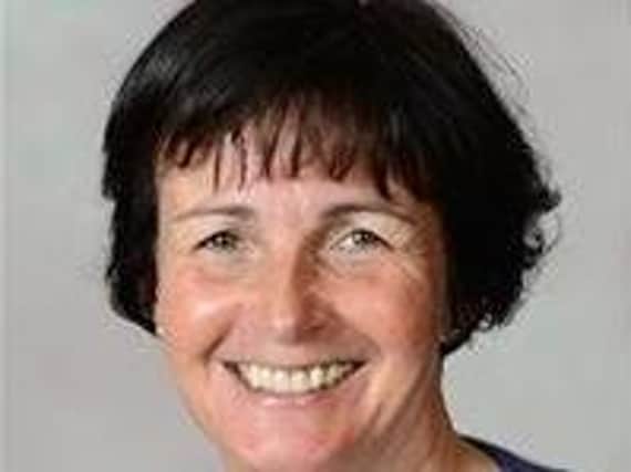 County Councillor Phillippa Williamson has urged parents not to congregate outside school