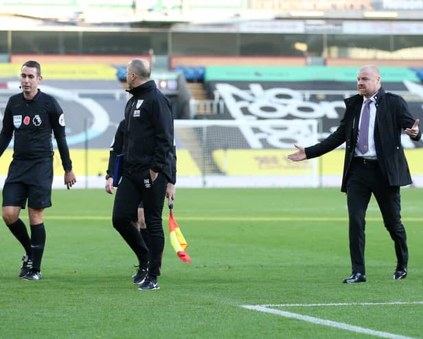 Sean Dyche gets a point across to the referee at half-time